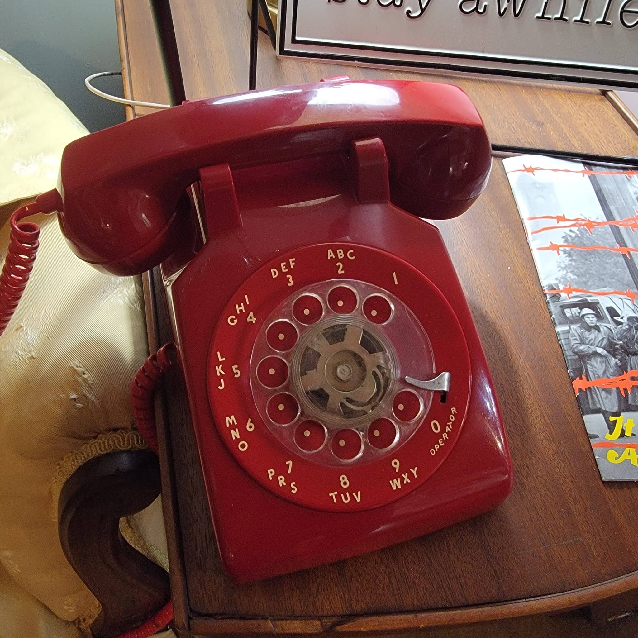 Vintage red rotary phone for rental
